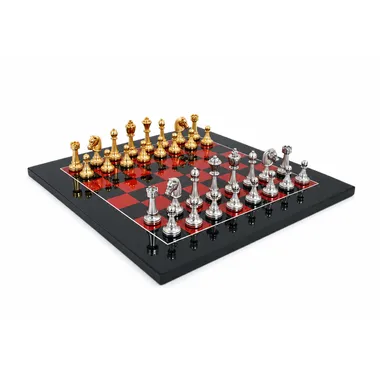 Jogo de xadrez completo Fleuri sobre tabuleiro preto e vermelho brilhante, vista geral